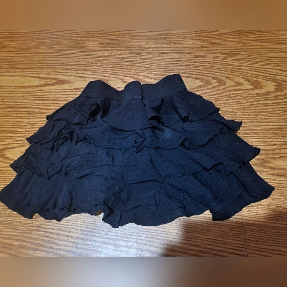 Girls small black ruffled skirt